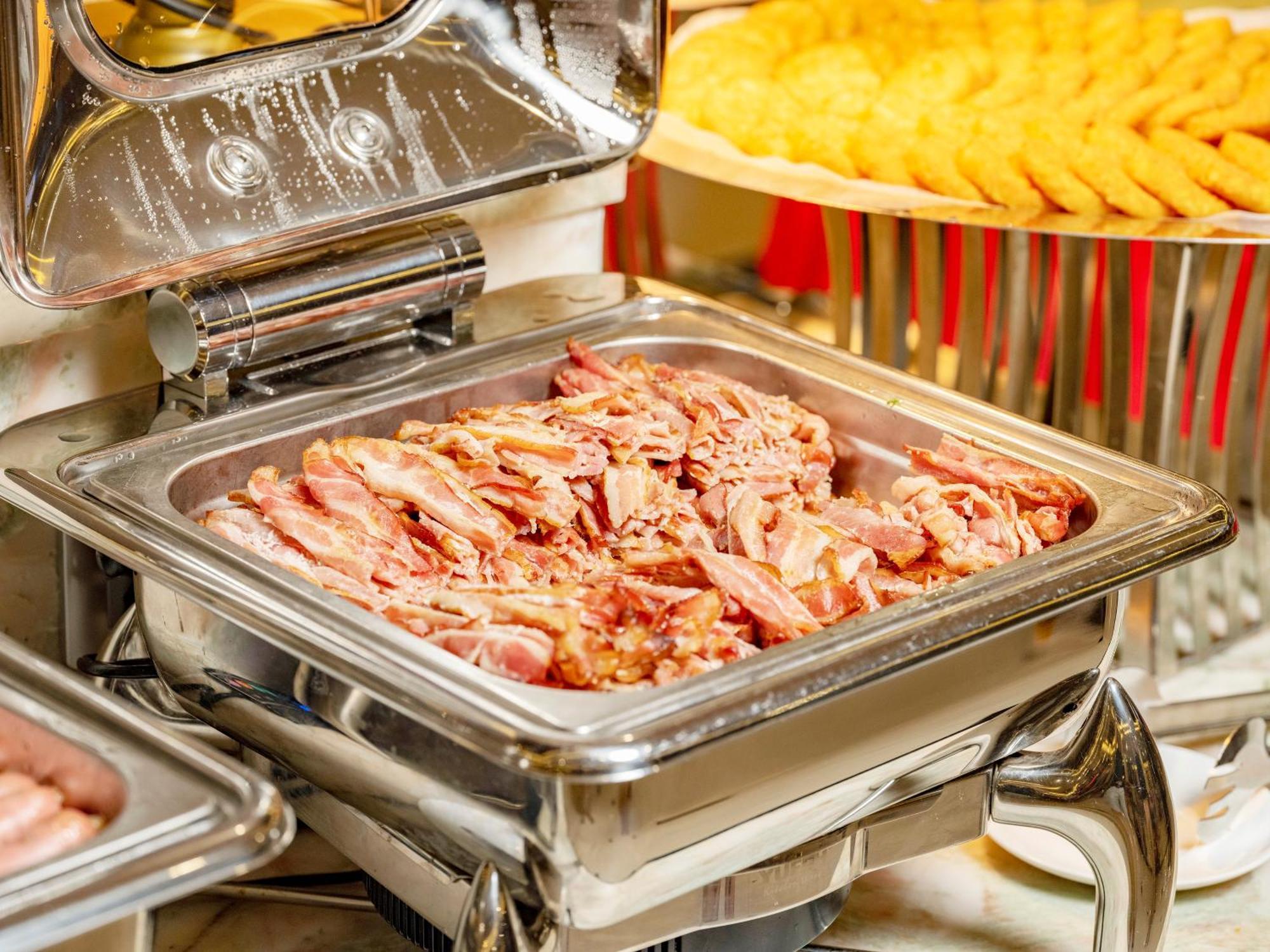 Dlg岘港酒店 外观 照片 Bacon in a chafing dish